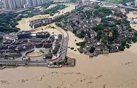 ৰুষ্ট প্ৰকৃতিৰ খং : ভাৰত আৰু নিউয়ৰ্কৰ পিচত ৰঙাচীনত জল প্ৰলয় , বানৰ তাণ্ডৱ : ১৫ জনৰ মৃত্যু : ৪০ হেজাৰ স্থানান্তৰিত :